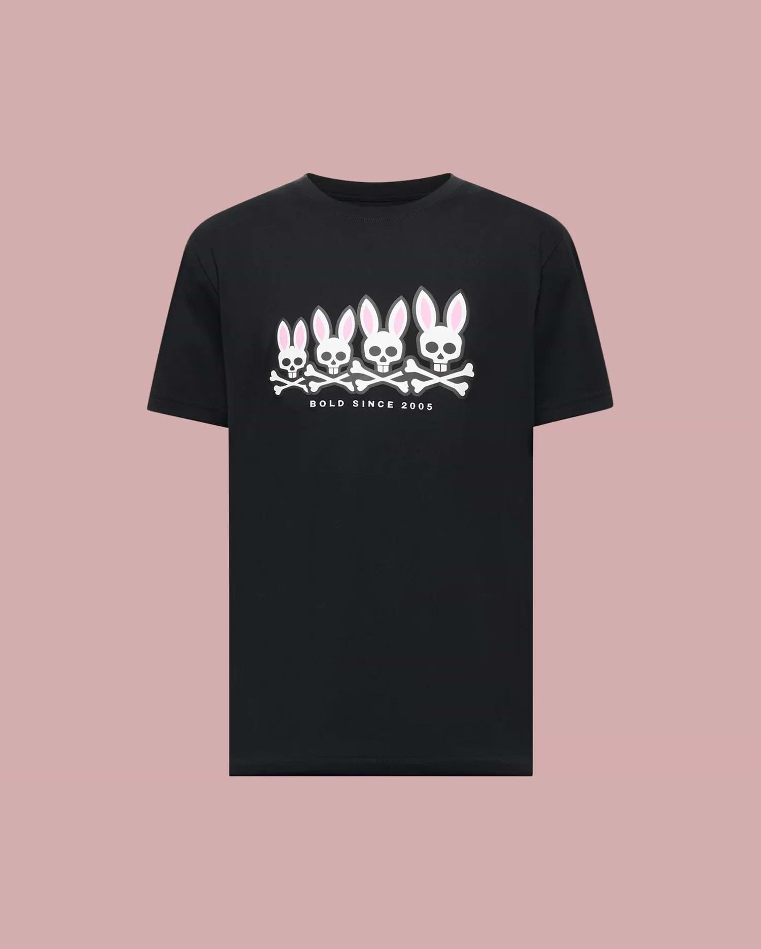 The Psycho Bunny MENS ARCHIVE GRADIANT BUNNY GRAPHIC TEE (MT0200029) showcases four iconic white and pink Bunny skull and crossbones with "BOLD SINCE 2005" text, set against a plain light pink background. (1)