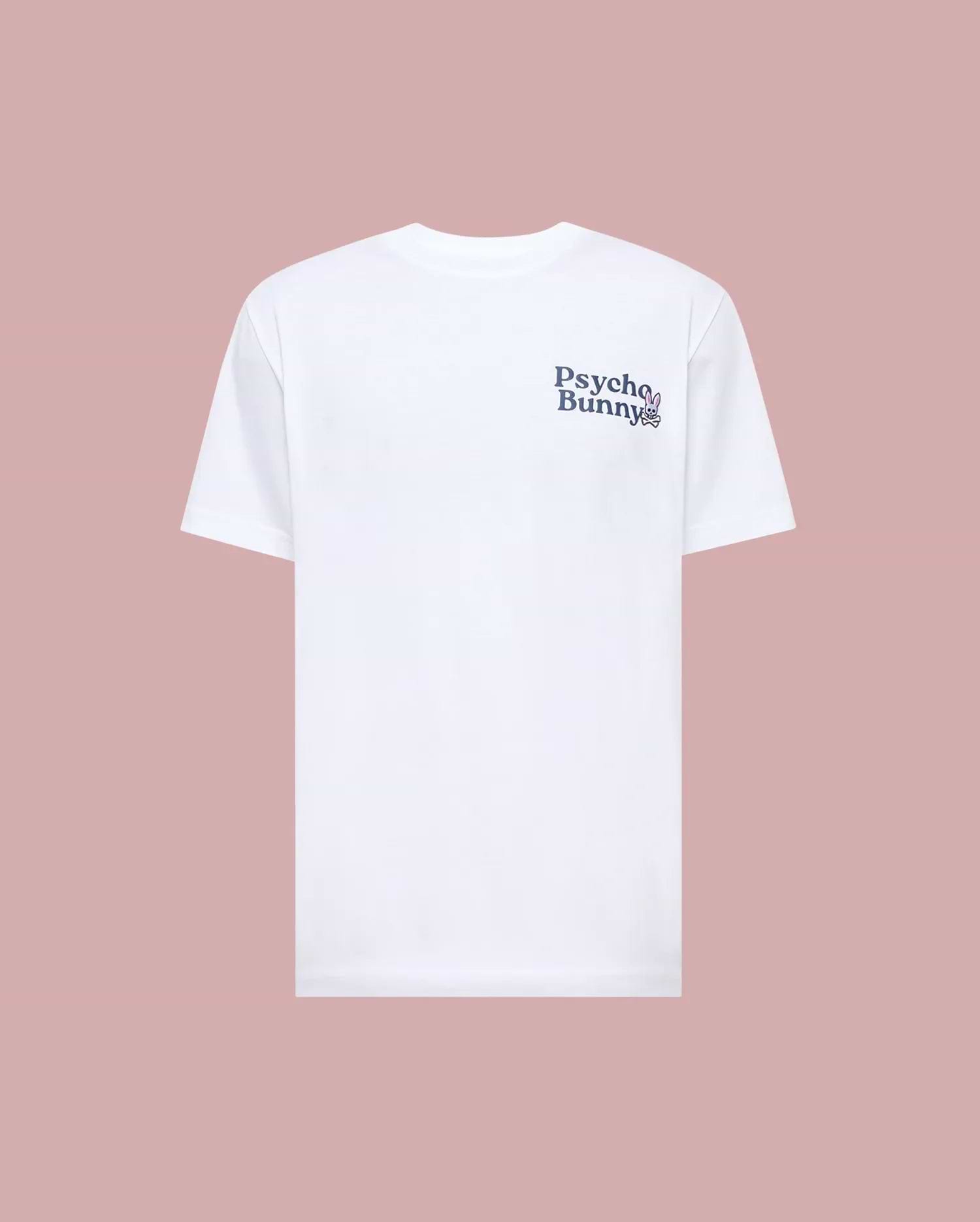 The MENS ARCHIVE WORDMARK GRAPHIC TEE - MT0200030 by Psycho Bunny is a regular fit white short-sleeve tee, shown on a pink background, with the Psycho Bunny wordmark and bunny logo in dark print on the left chest. (1)