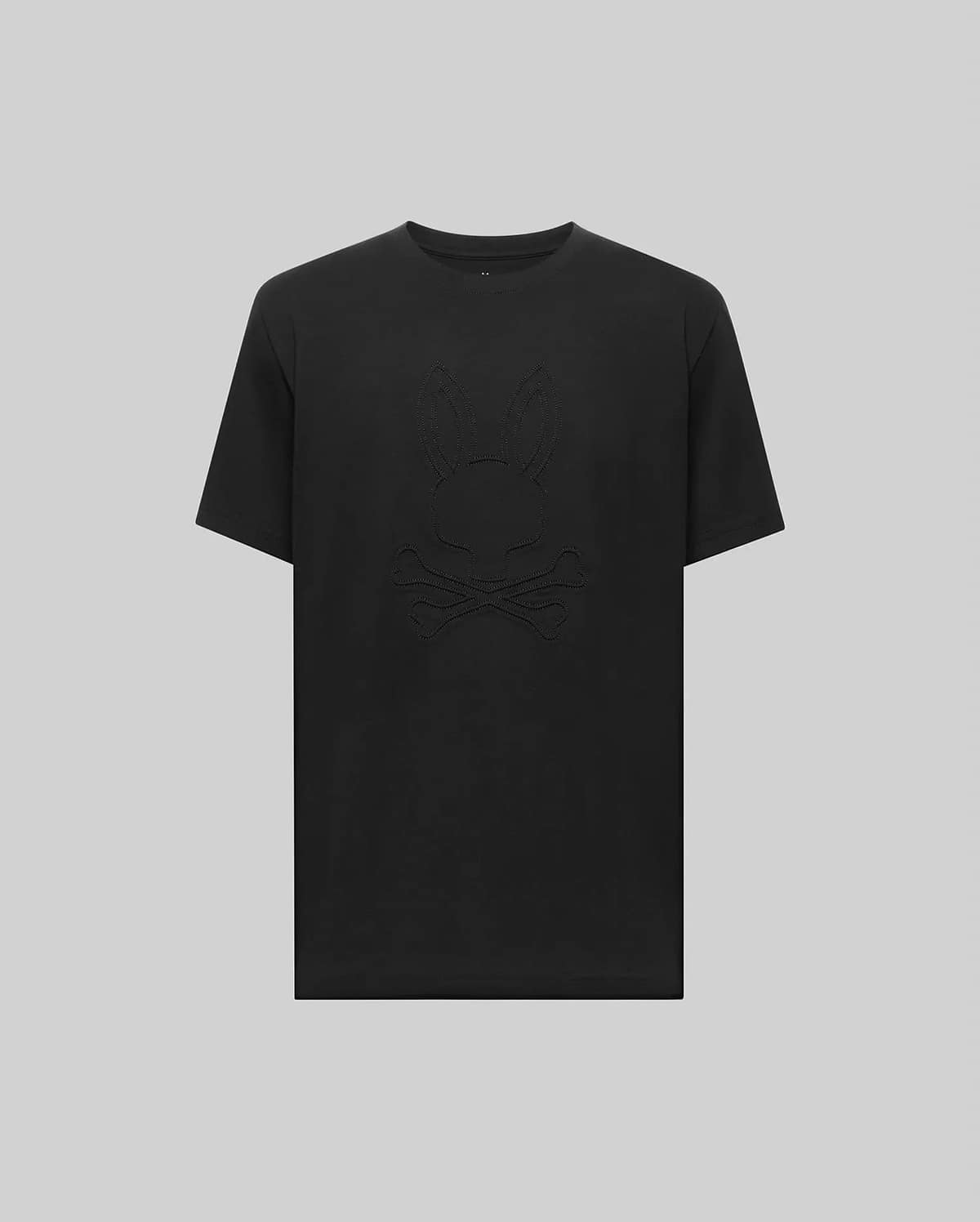 The Psycho Bunny MENS REMY GRAPHIC TEE - MT0200059 is crafted from soft Pima cotton and features a subtle embossed bunny logo above crossed bones on the front, shown against a plain light gray background.