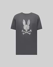 The Psycho Bunny MENS GRANT BUNNY GRAPHIC TEE - MT0200081 is a dark gray Pima cotton shirt made in Peru, featuring a playful white bunny head above crossed bones, centered on the chest. (1)