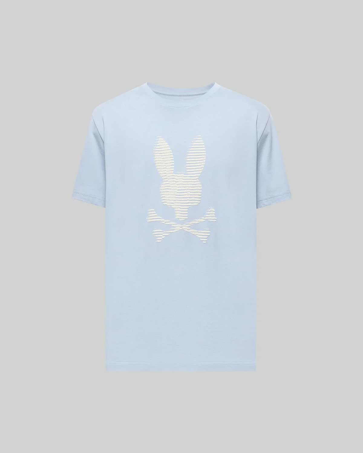 The Psycho Bunny MENS GRANT BUNNY GRAPHIC TEE (MT0200081) features a soft light blue Pima cotton fabric with a bold white stylized bunny head and crossed bones graphic on the front, adding a playful edge to men's fashion. (1)
