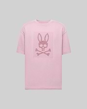 The Psycho Bunny MENS REECE OVERSIZED TEE (MT0200082) is a light pink, heavyweight jersey tee in a relaxed fit, featuring a centered skull with bunny ears above crossed bones on the chest against a plain gray background. (5)