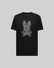 The Psycho Bunny MENS ROWEN BUNNY GRAPHIC TEE (MT0200101) features a large gray bunny face with crossed bones in graphic style, crafted from soft Pima cotton and set against a light gray background.