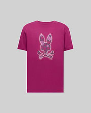 The Psycho Bunny MENS ROWEN BUNNY GRAPHIC TEE (MT0200101) is a magenta Pima cotton tee featuring a bold floral-patterned bunny head above crossed bones, displayed on a simple gray backdrop. (1)