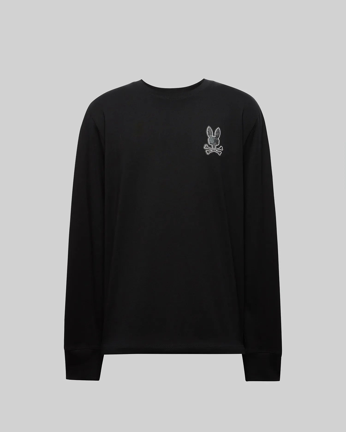 The MENS ROWEN GRAPHIC TEE - MT0200103 by Psycho Bunny is a black long sleeve crewneck featuring a small white outlined cartoon bunny patch on the left chest, shown against a plain light gray background. (6)