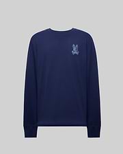 The Psycho Bunny MENS ROWEN GRAPHIC TEE (MT0200103) is a navy Pima cotton long sleeve shirt with a small embroidered rabbit and crossbones patch on the upper left chest, shown on a plain gray background.