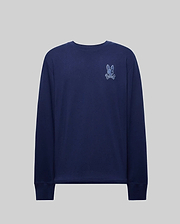 The Psycho Bunny MENS ROWEN GRAPHIC TEE (MT0200103) is a navy Pima cotton long sleeve shirt with a small embroidered rabbit and crossbones patch on the upper left chest, shown on a plain gray background.