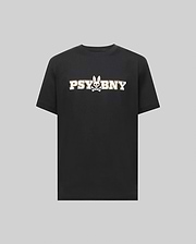 The MENS WADE GRAPHIC TEE - MT0200105 by Psycho Bunny is a black, 100% cotton short-sleeve shirt featuring bold white "PSYBNY" text and a bunny face with crossbones graphic, shown on a plain gray background. (1)