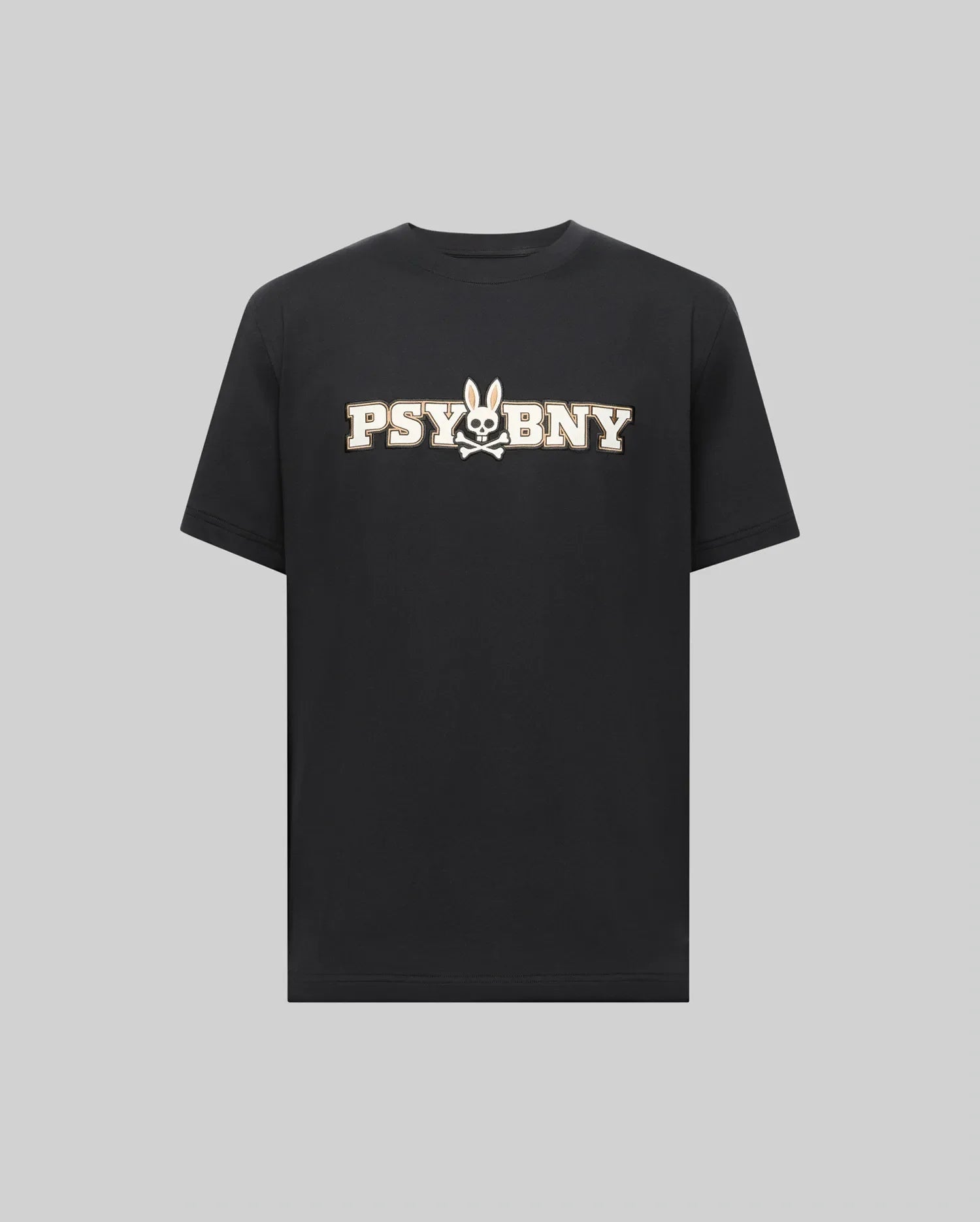 The MENS WADE GRAPHIC TEE - MT0200105 by Psycho Bunny is a black, 100% cotton short-sleeve shirt featuring bold white "PSYBNY" text and a bunny face with crossbones graphic, shown on a plain gray background. (1)