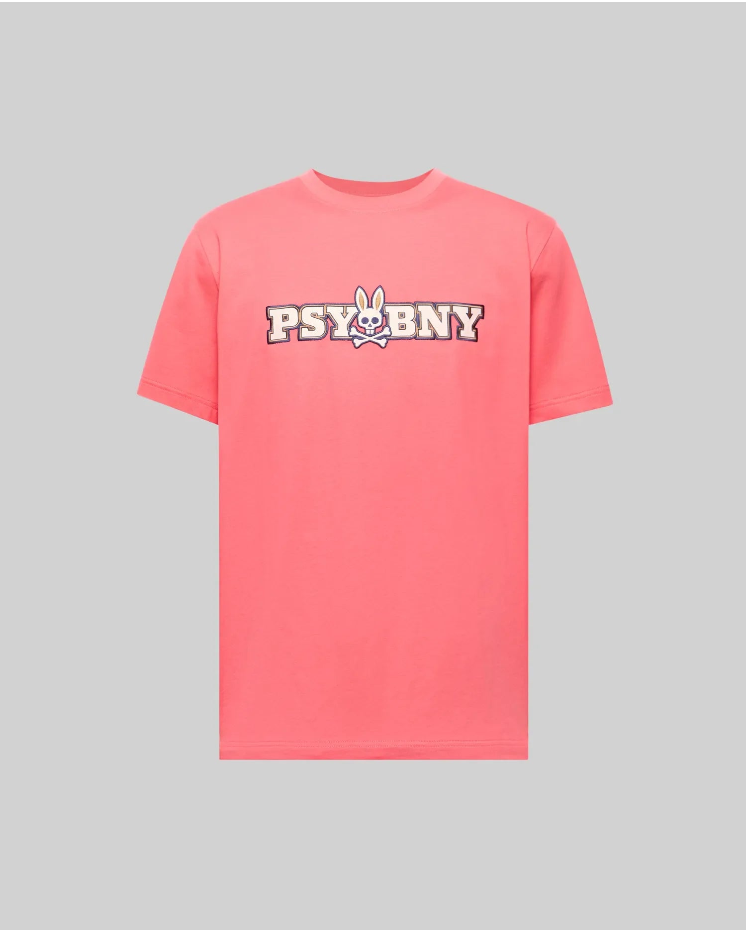 The Psycho Bunny MENS WADE GRAPHIC TEE (MT0200105) is a 100% cotton pink regular-fit shirt, featuring "PSYBNY" with a cartoon bunny face for the "U," shown on a plain gray background. (1)