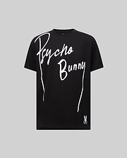 The MENS SOREN GRAPHIC TEE - MT0200180 by Psycho Bunny is a black 100% cotton tee featuring a bold white "Psycho Bunny" wordmark and bunny skull logo near the hem, shown on a plain gray background. (1)