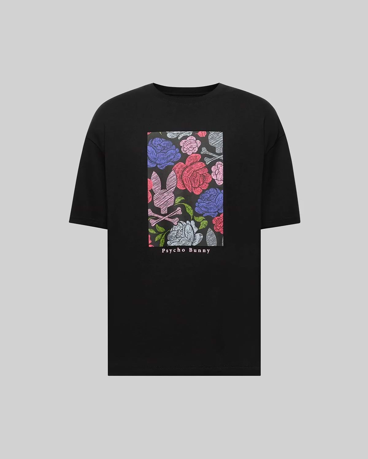 The Psycho Bunny MENS ROWEN OVERSIZED TEE (MT0200194) is a black relaxed-fit shirt with a vibrant chest floral graphic—pink, blue, and red roses plus a white bunny logo—and "Psycho Bunny" printed below for a bold touch.