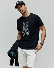 Mens Olivier Graphic Tee, a classic fit black jersey t-shirt featuring a large, textured white Psycho Bunny skull and crossbones graphic prominently on the chest. (2)