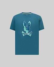 Mens Olivier Graphic Tee, a classic fit teal jersey t-shirt featuring a large pixelated teal and blue Psycho Bunny skull graphic on the chest and a small embroidered logo on the back neck. (1)