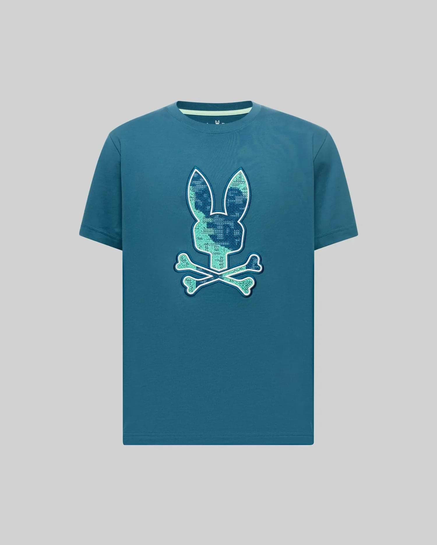 Mens Olivier Graphic Tee, a classic fit teal jersey t-shirt featuring a large pixelated teal and blue Psycho Bunny skull graphic on the chest and a small embroidered logo on the back neck. (1)