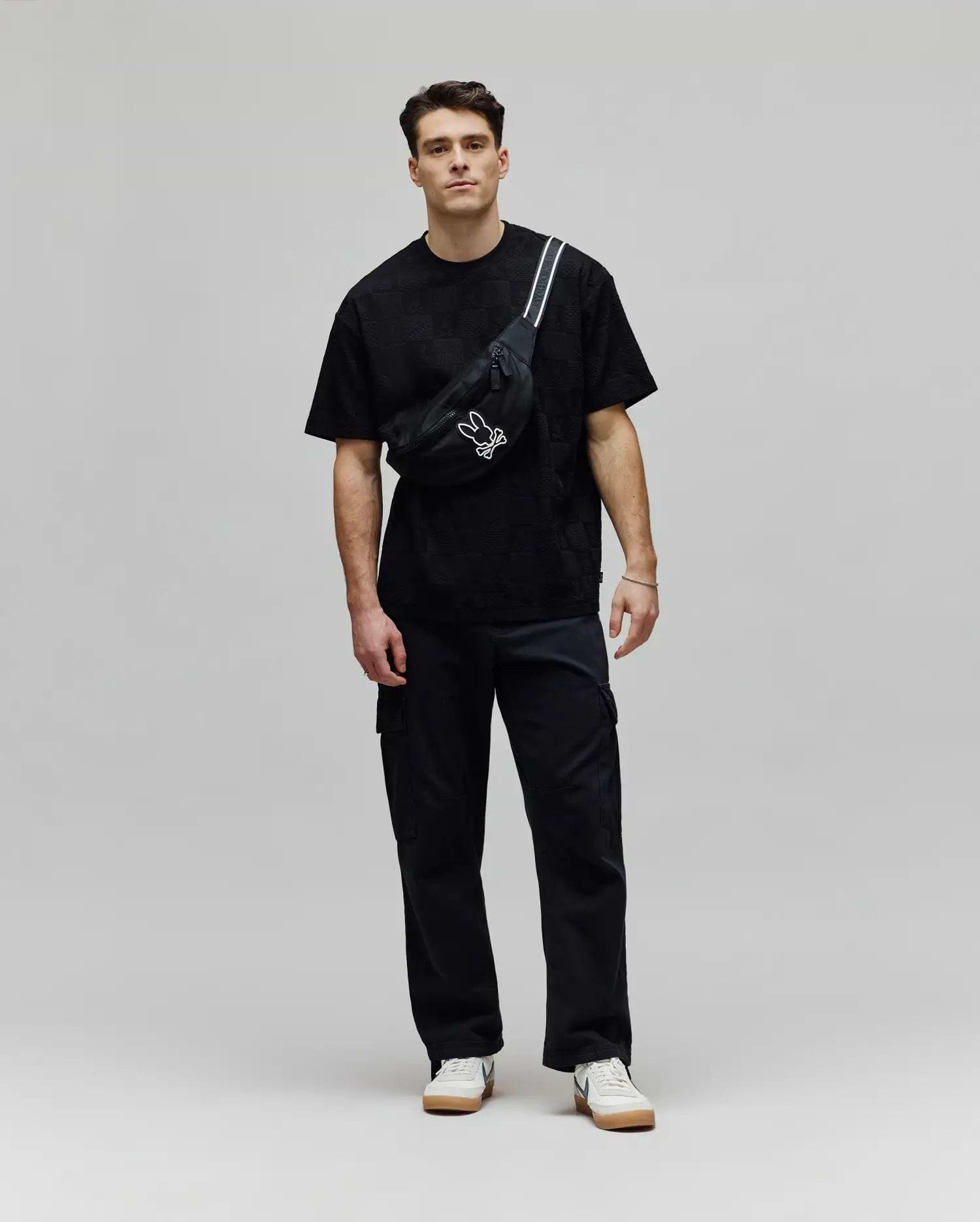 Mens Dustin Oversized Tee, a premium black oversized t-shirt with a refined streetwear aesthetic, featuring a subtle, all-over textured checkerboard pattern intricately woven into the soft fabric for a unique finish. (3)
