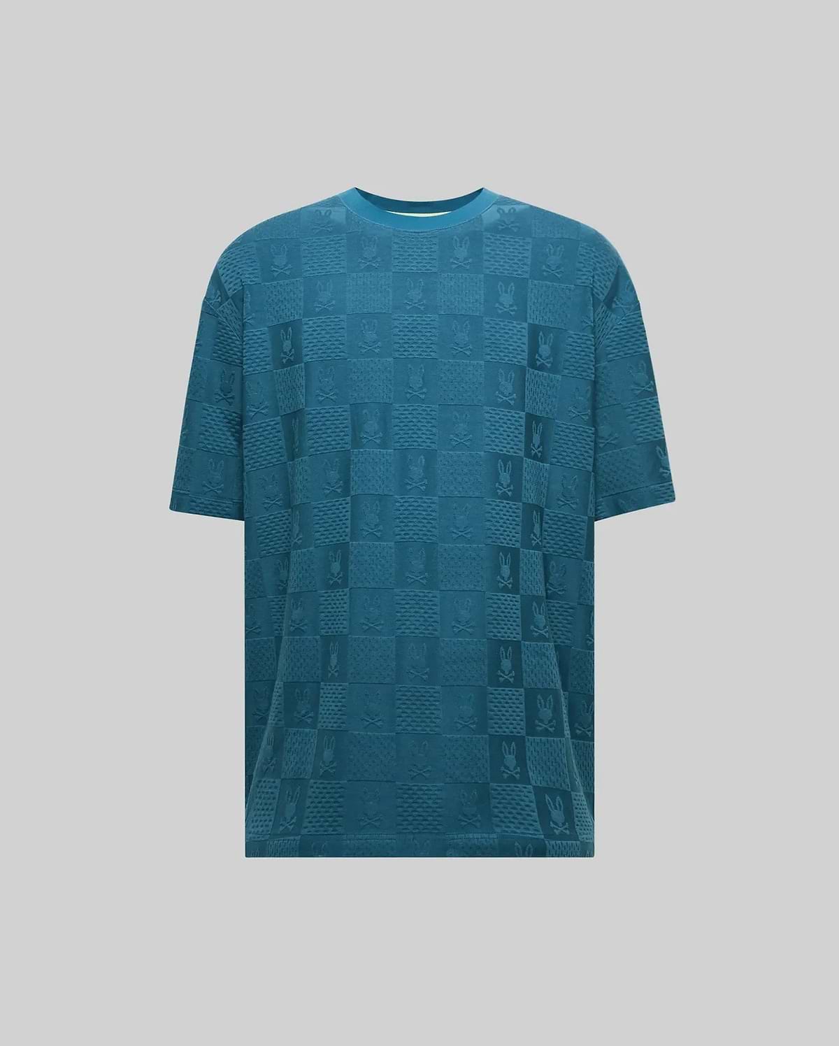 Mens Dustin Oversized Tee in teal, featuring an all-over tonal jacquard checkerboard pattern with alternating Psycho Bunny skull logos and textured squares, offering a relaxed fit. (5)