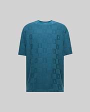 Mens Dustin Oversized Tee in teal, featuring an all-over tonal jacquard checkerboard pattern with alternating Psycho Bunny skull logos and textured squares, offering a relaxed fit. (5)