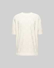 Creamy white relaxed fit t-shirt with an all-over subtle checkerboard pattern featuring embossed Psycho Bunny skull logos and textured squares in a jacquard knit. (4)