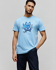 Mens Oscar Graphic Tee, light blue classic fit jersey knit t-shirt with a large central chest graphic featuring multiple blue Psycho Bunny skull logos, crossbones, and script. (5)