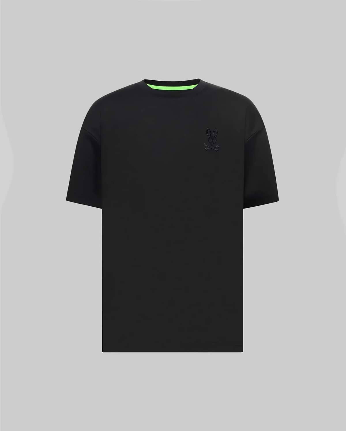 Mens Oscar Oversized Tee, black jersey knit with a relaxed fit, featuring a tonal embroidered Psycho Bunny skull logo on the left chest and a vibrant neon green inner collar.