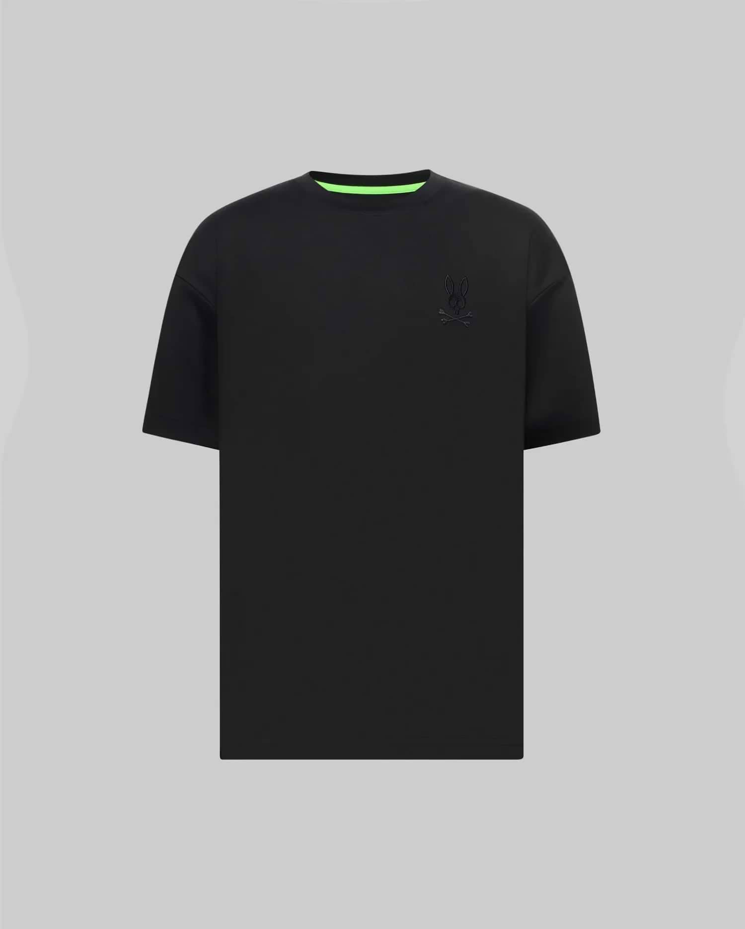Mens Oscar Oversized Tee, black jersey knit with a relaxed fit, featuring a tonal embroidered Psycho Bunny skull logo on the left chest and a vibrant neon green inner collar.