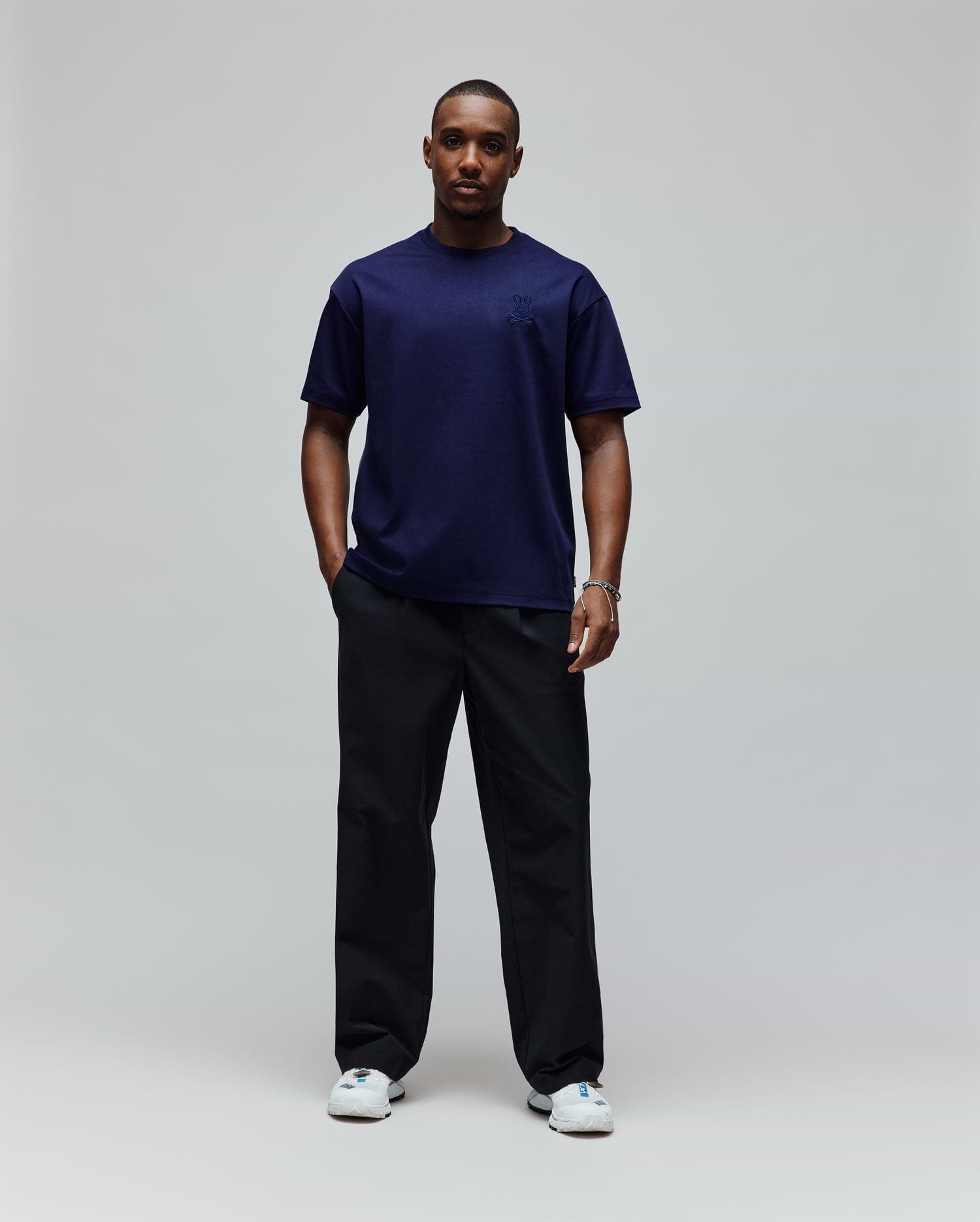 Mens Oscar Oversized Tee, a navy blue oversized t-shirt in smooth jersey knit, featuring a tonal embroidered Psycho Bunny skull logo on the left chest.