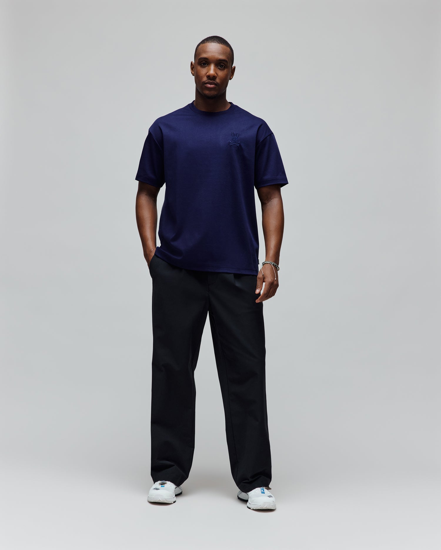Mens Oscar Oversized Tee, a navy blue oversized t-shirt in smooth jersey knit, featuring a tonal embroidered Psycho Bunny skull logo on the left chest.
