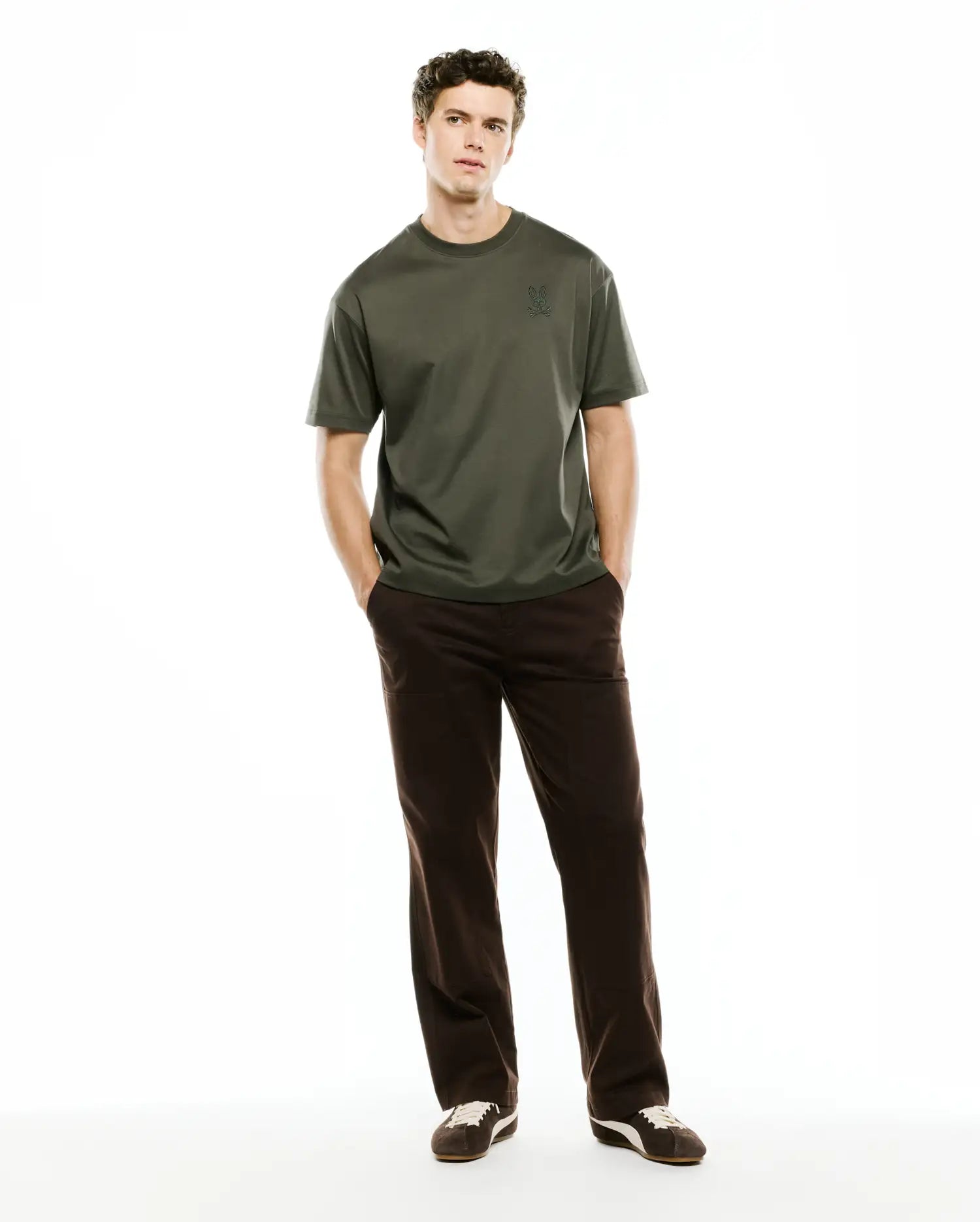 Mens Oscar Relaxed Fit Tee in dark olive green jersey knit, featuring a small, tone-on-tone embroidered Psycho Bunny skull logo on the left chest.