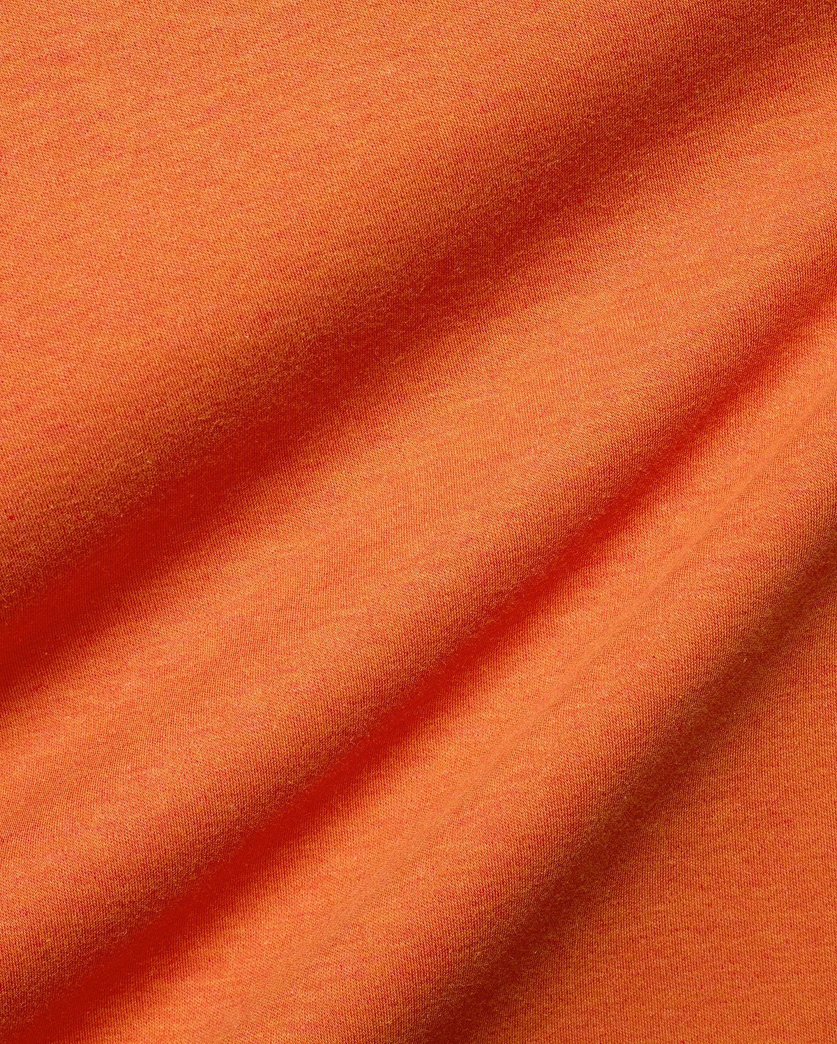 Men's Oscar Oversized Tee, a premium streetwear staple in vibrant heathered orange, crafted from soft jersey knit fabric with natural folds, offering a comfortable, relaxed fit. (6)