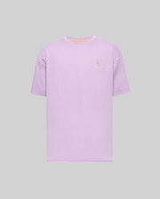 Mens Oscar Oversized Tee, a lavender oversized jersey t-shirt featuring a small embroidered Psycho Bunny skull logo on the left chest and a subtle orange neckline trim. (4)