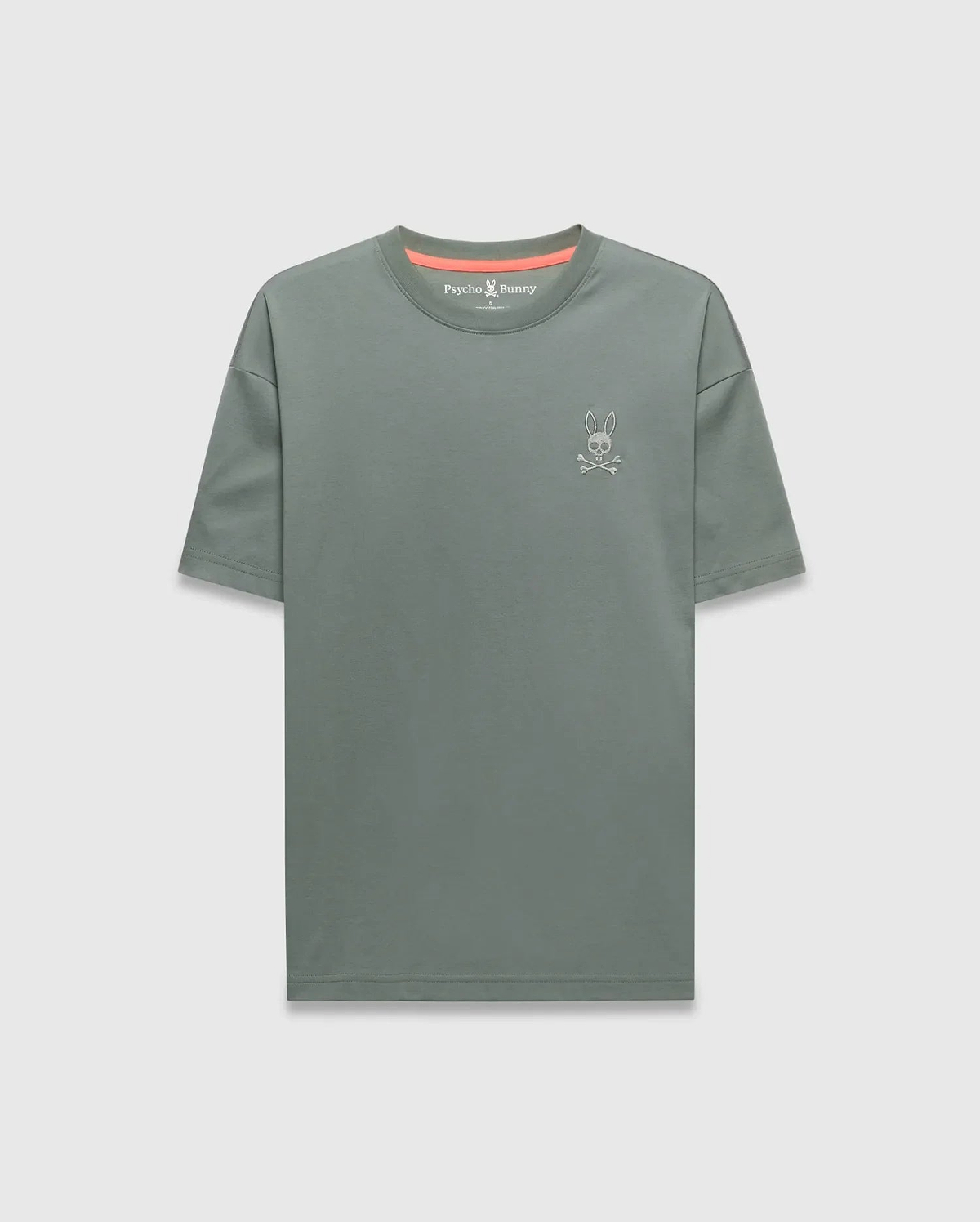 Mens Oscar Oversized Tee in sage green, featuring a relaxed fit, smooth jersey fabric, and a small embroidered white Psycho Bunny skull logo on the left chest, with a bright orange inner neckline.