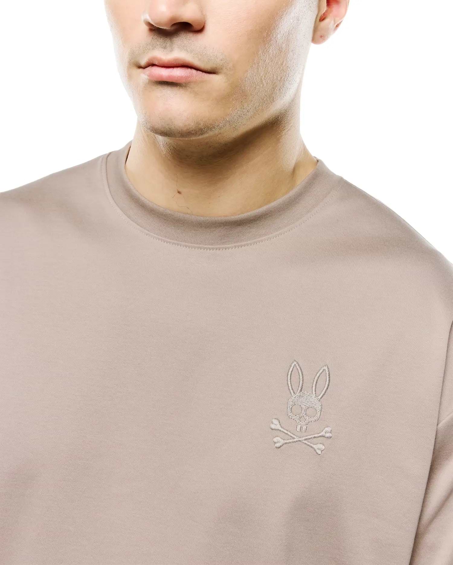 Men's Oscar Oversized Tee in taupe smooth jersey, featuring a small, tonal embroidered Psycho Bunny skull logo on the left chest. (2)