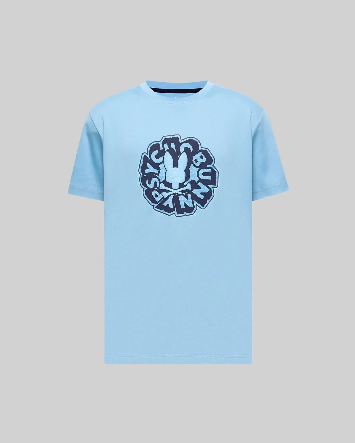 Mens Toby Graphic Tee, light blue, classic fit, smooth jersey knit, featuring a large central dark blue graphic print of the iconic Psycho Bunny skull logo and stylized text.