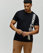 Mens Toby Wordmark Tee, black classic fit jersey t-shirt with a bold vertical white and pink-outlined Psycho Bunny wordmark and skull logo on the right. (1)