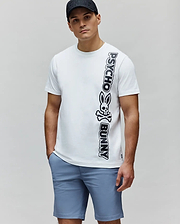 White Mens Toby Wordmark Tee, classic fit, smooth jersey knit, featuring a large vertical black Psycho Bunny wordmark and skull logo on the left side. (1)