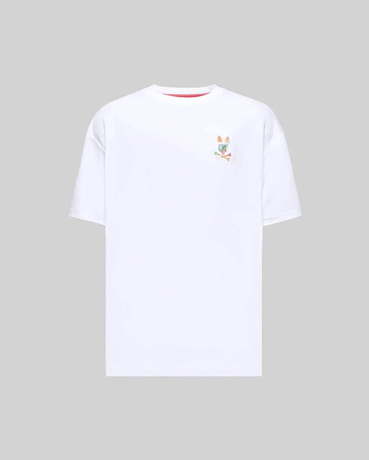 Mens Ara Oversized Tee, a white oversized jersey t-shirt featuring a small, multicolor embroidered Psycho Bunny skull logo on the left chest and subtle red collar trim. (4)