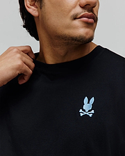 Black Mens Aiden Back Graphic Tee, a classic fit jersey knit t-shirt with a small, light blue embroidered Psycho Bunny skull logo on the left chest. (3)