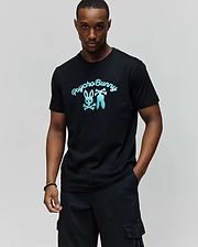 Black Mens Aram Graphic Tee in classic fit jersey, featuring a large teal gradient Psycho Bunny skull and crossbones logo with script text on the chest. (2)