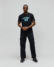 Mens Aram Graphic Tee, a classic fit black soft jersey t-shirt featuring a large, vibrant light blue Psycho Bunny script logo and iconic bunny skull graphic on the chest. (4)