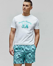 Mens Aram Graphic Tee in classic fit white jersey, featuring a large central chest graphic with Psycho Bunny script, the iconic bunny skull, and bunny tail elements in a vibrant teal gradient. (2)