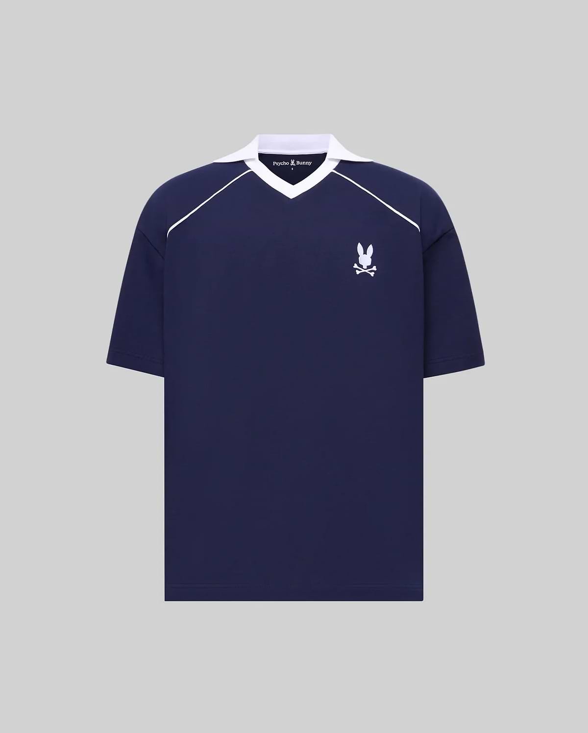 Mens Toby Jersey navy collared V-neck shirt with white raglan stripes, embroidered white Psycho Bunny skull logo on left chest. Relaxed fit jersey, small brand text on collar. (5)