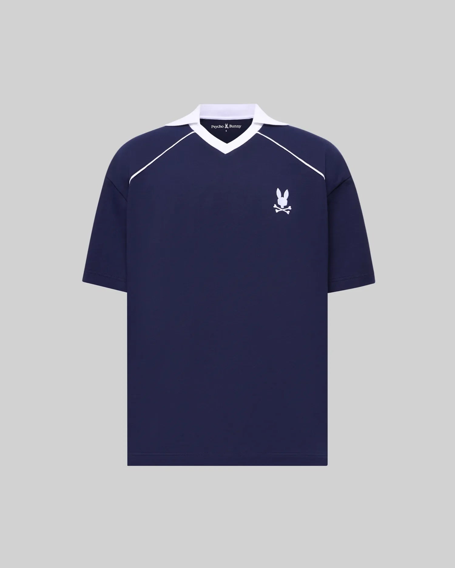 Mens Toby Jersey navy collared V-neck shirt with white raglan stripes, embroidered white Psycho Bunny skull logo on left chest. Relaxed fit jersey, small brand text on collar. (5)