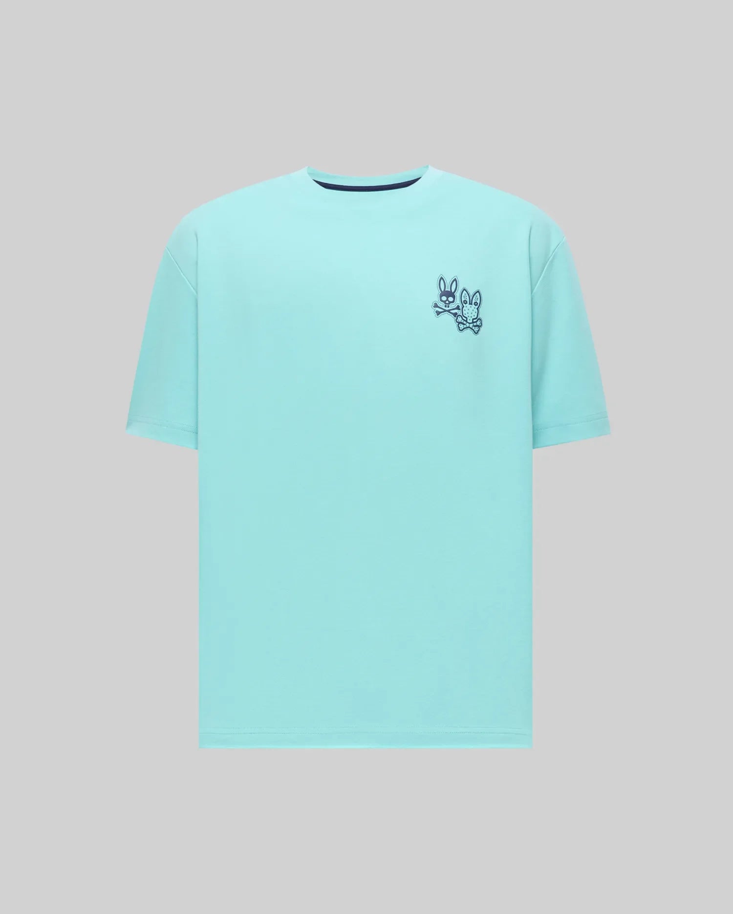 Mens Luke Back Graphic Tee: Relaxed fit aqua jersey t-shirt with a small dark blue double Psycho Bunny skull and crossbones graphic on the front left chest and a navy neck trim. (5)
