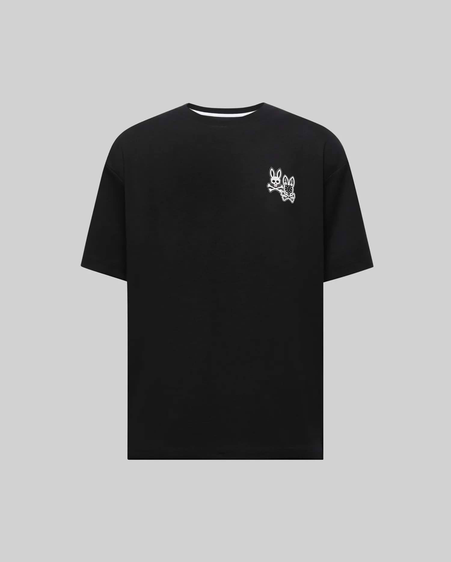 Mens Luke Back Graphic Tee, a black relaxed fit jersey knit t-shirt featuring a small white iconic Psycho Bunny skull and patterned bunny graphic on the left chest.
