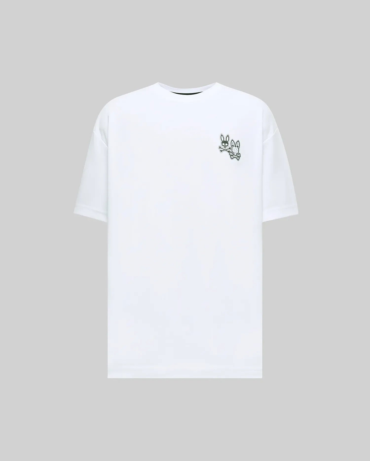 White Mens Luke Back Graphic Tee, a relaxed fit jersey t-shirt featuring two small dark green Psycho Bunny skull and crossbones logos on the left chest.