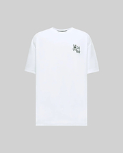 White Mens Luke Back Graphic Tee, a relaxed fit jersey t-shirt featuring two small dark green Psycho Bunny skull and crossbones logos on the left chest.