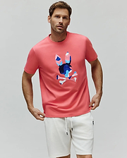 Mens Ara Graphic Tee in coral pink jersey knit, featuring a classic fit and a large central chest graphic of the iconic Psycho Bunny skull logo with blue, light blue, pink, and white geometric accents. (4)