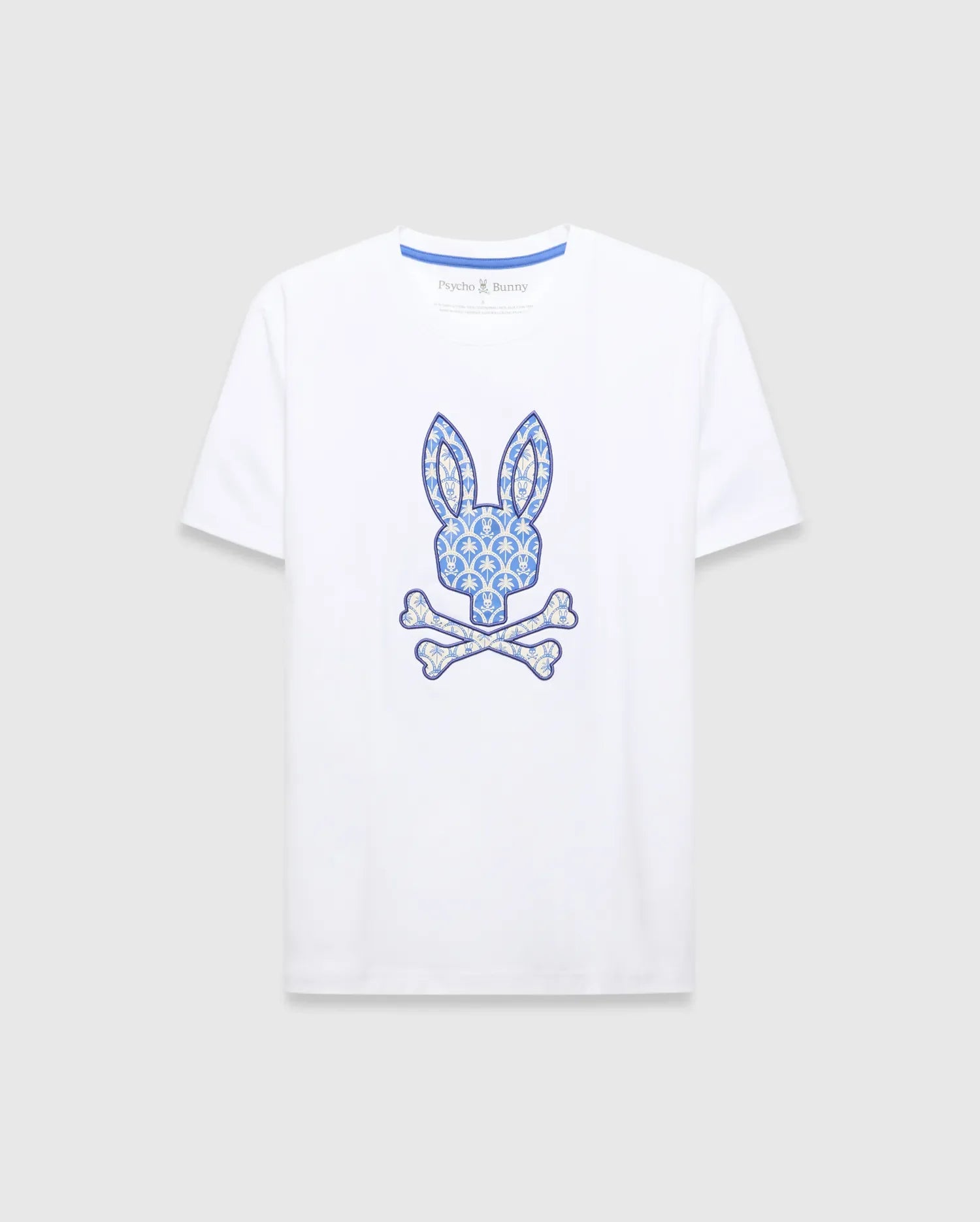 White Mens Brad Graphic Tee, classic fit jersey with a large central blue and cream patterned bunny skull logo and blue Psycho Bunny neck tape. (1)