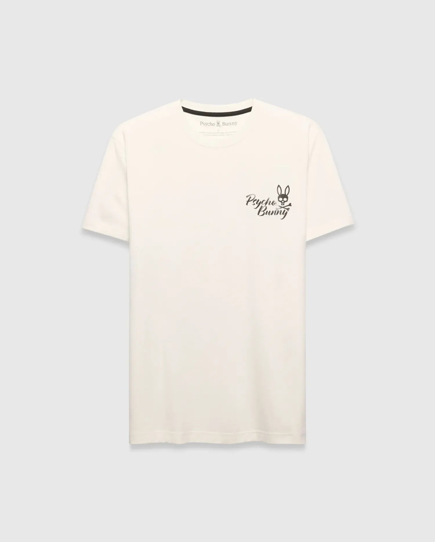 Mens Colin Back Graphic Tee, a cream classic-fit jersey t-shirt with a small black embroidered Psycho Bunny skull logo and script text on the left chest.